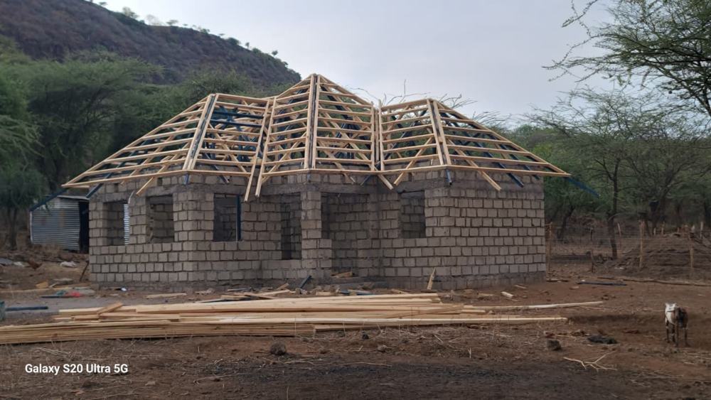 Hip roof trusses on a block-walled house